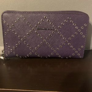 Michael kors wallet also holds phone wristlets